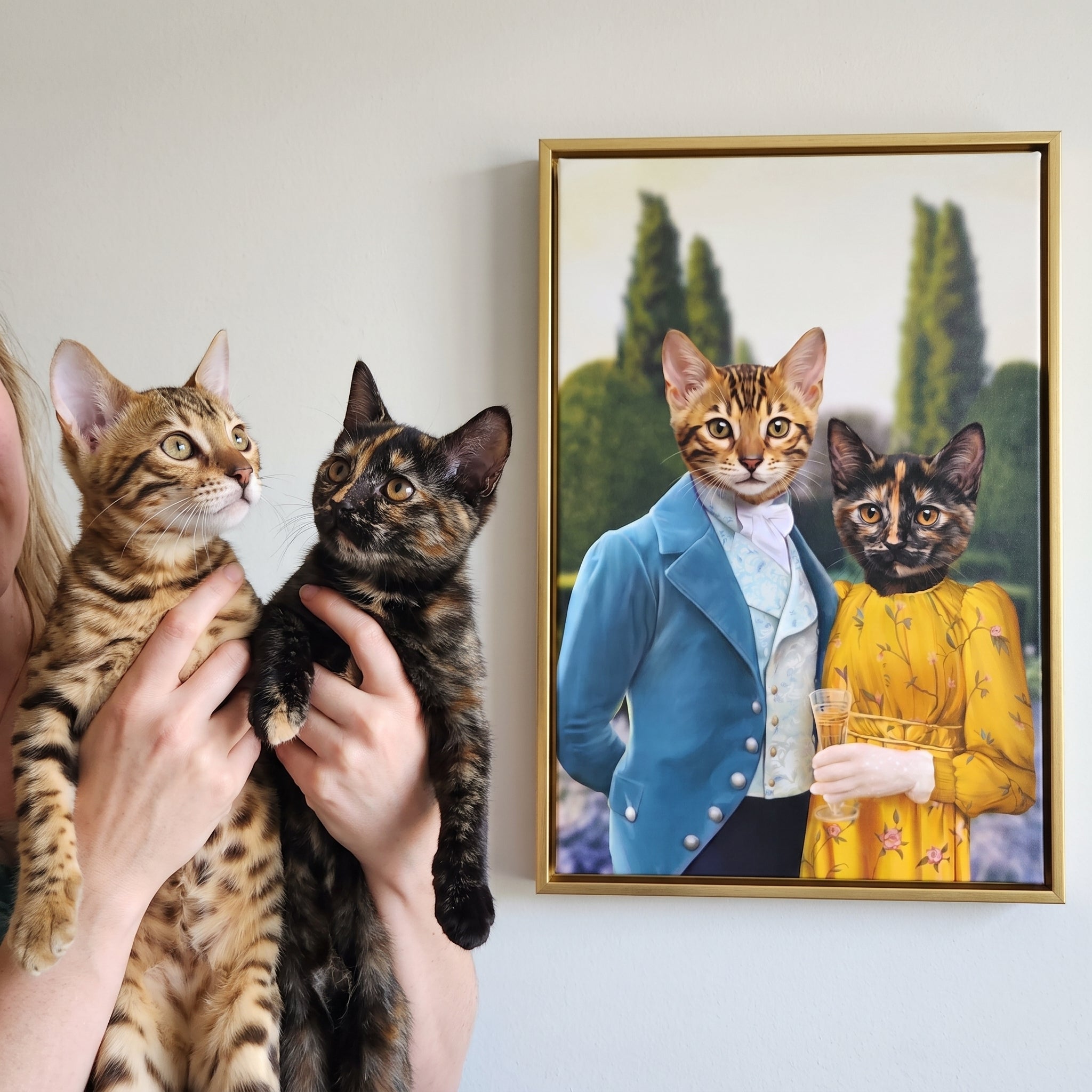 Bengal cat and tortoiseshell cat next to its Colin and Marina custom pet canvas