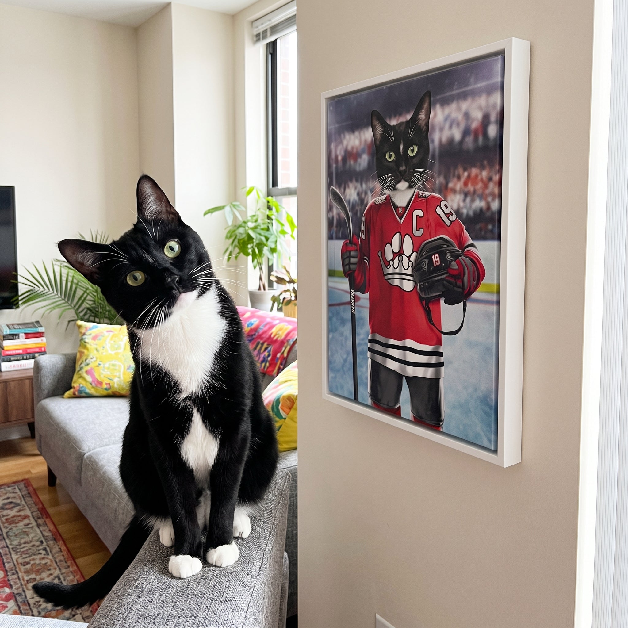 Tuxedo cat next to its The Barkers custom pet canvas