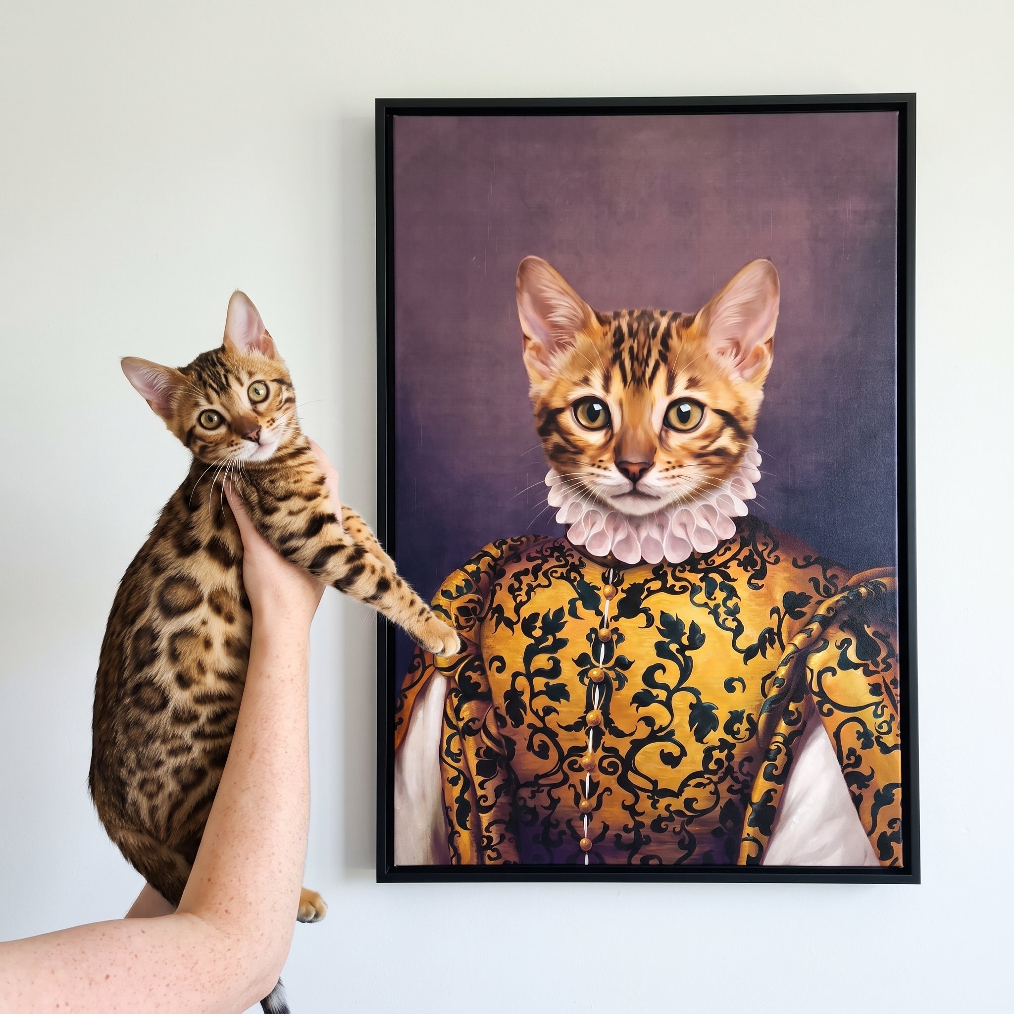 Bengal cat next to its The Golden Queen custom pet canvas
