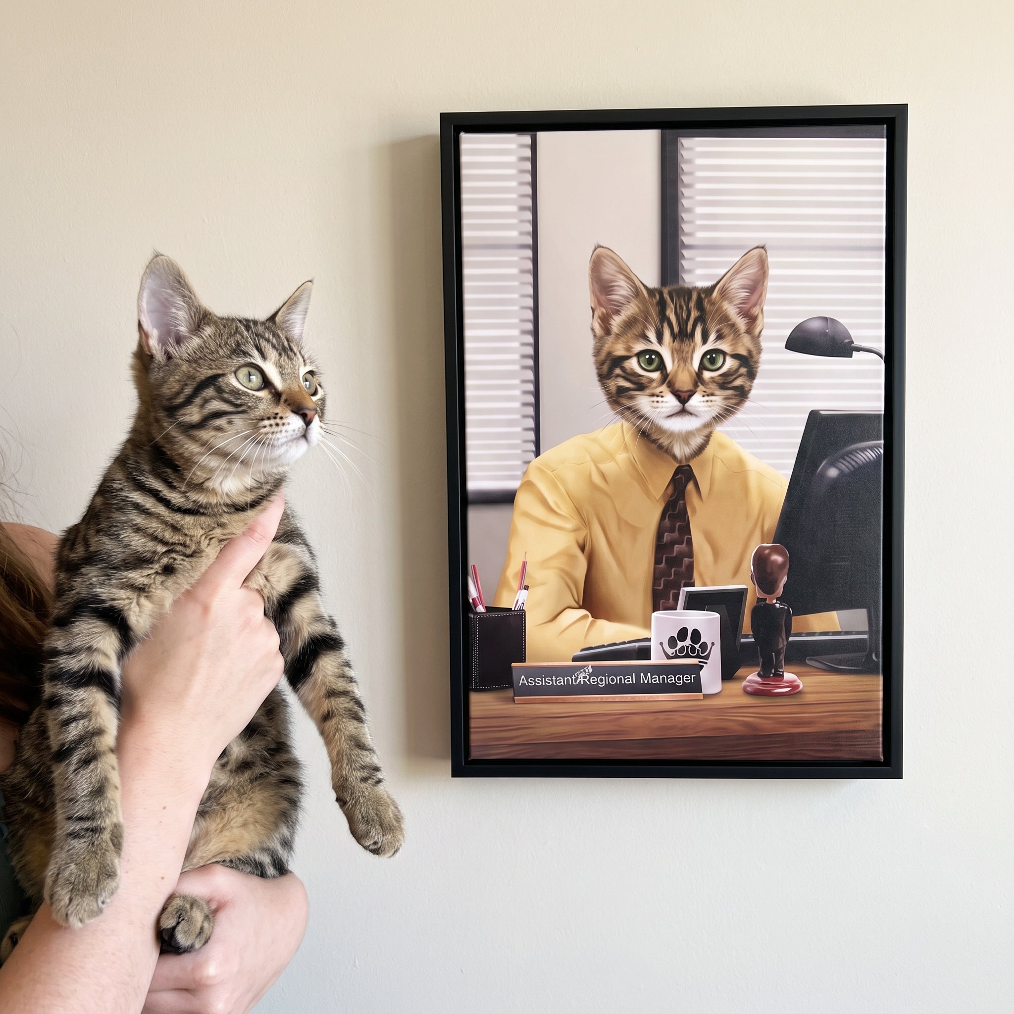 Brown tabby cat next to its The Pawssistant Manager custom pet canvas