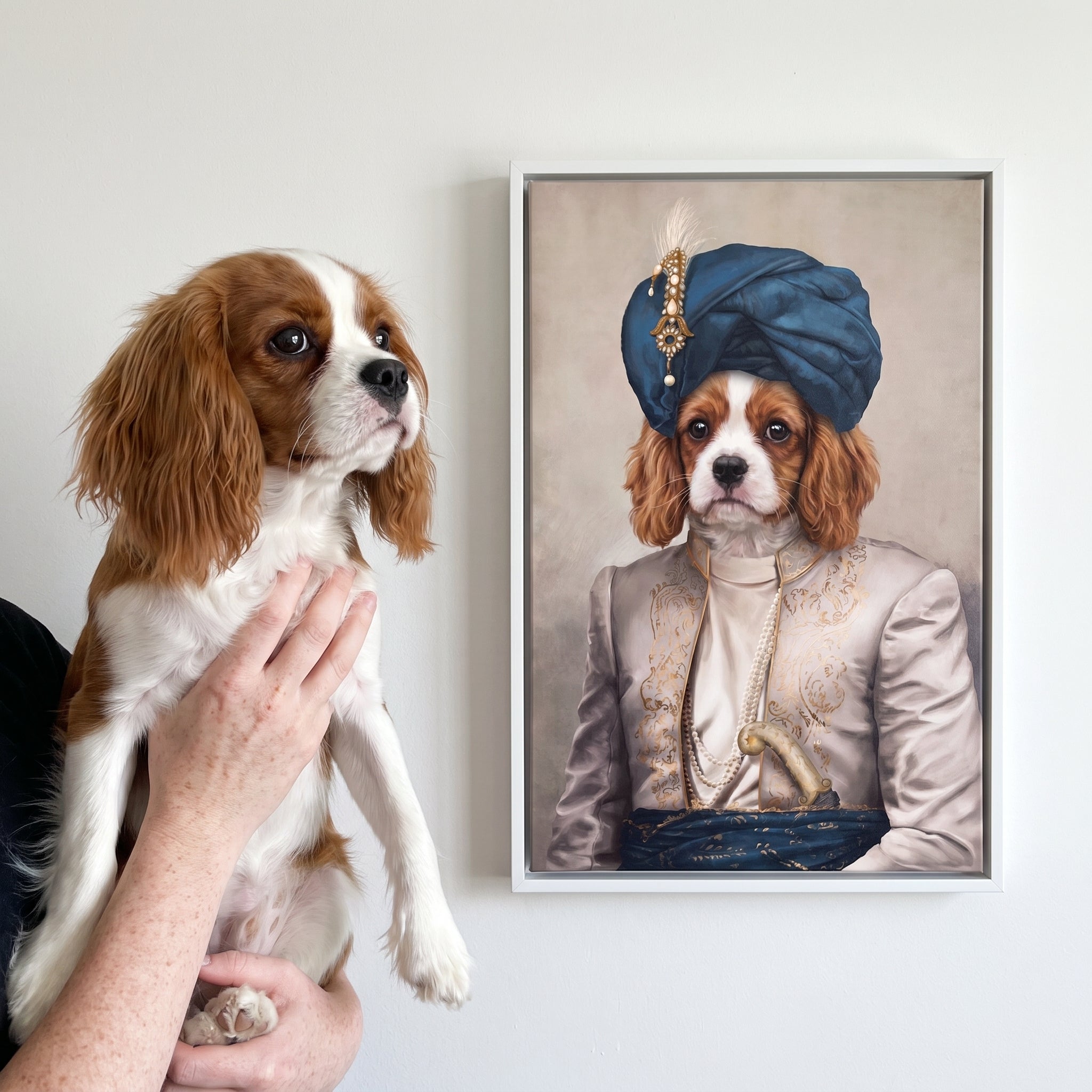 Cavalier king charles spaniel next to its The Persian Prince custom pet canvas