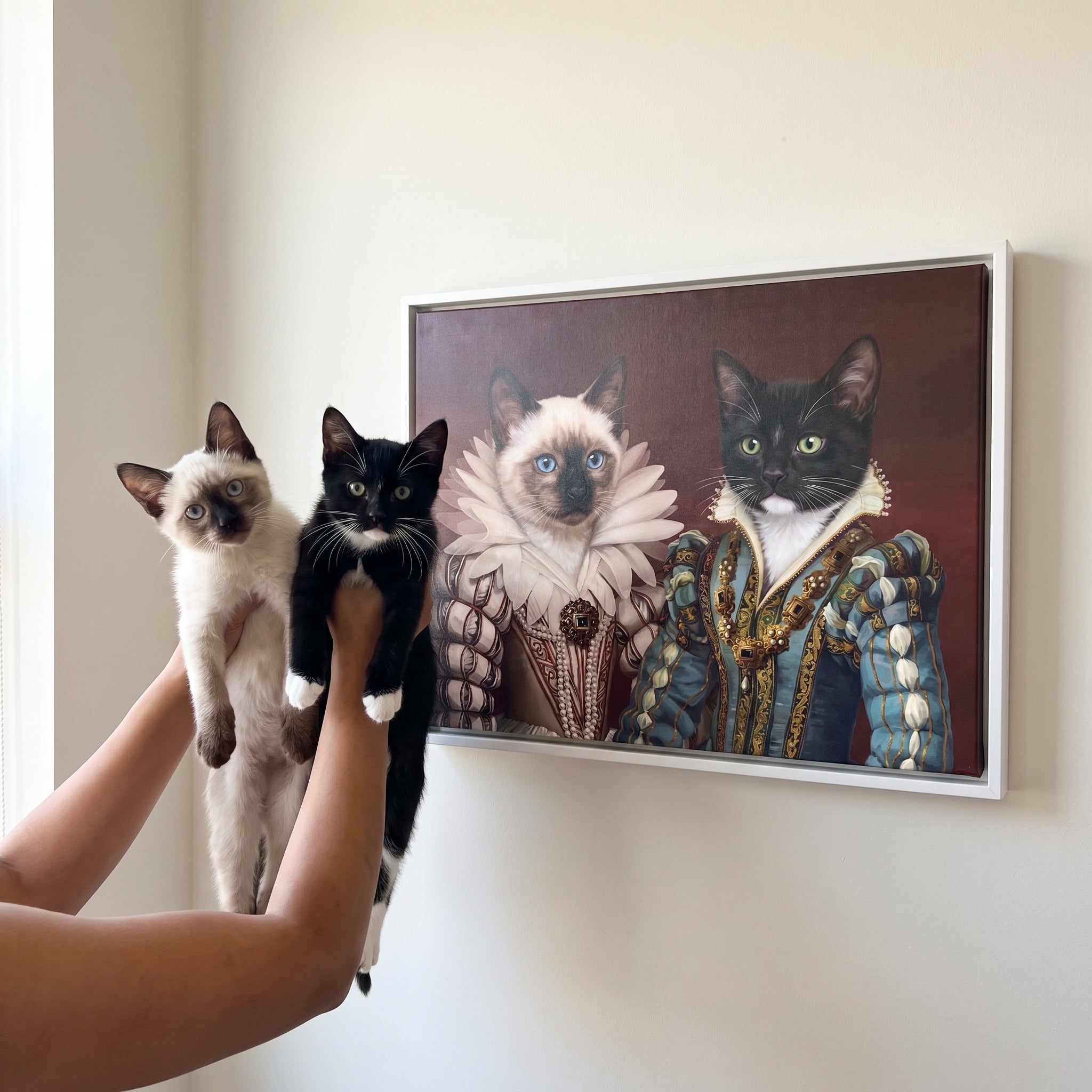 Siamese cat and tuxedo cat next to its The Queen and Sapphire Queen custom pet canvas