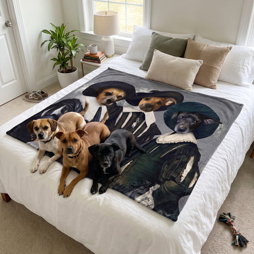 Three mixed-breed dogs with the Three Musketeers custom pet blanket: on the bed